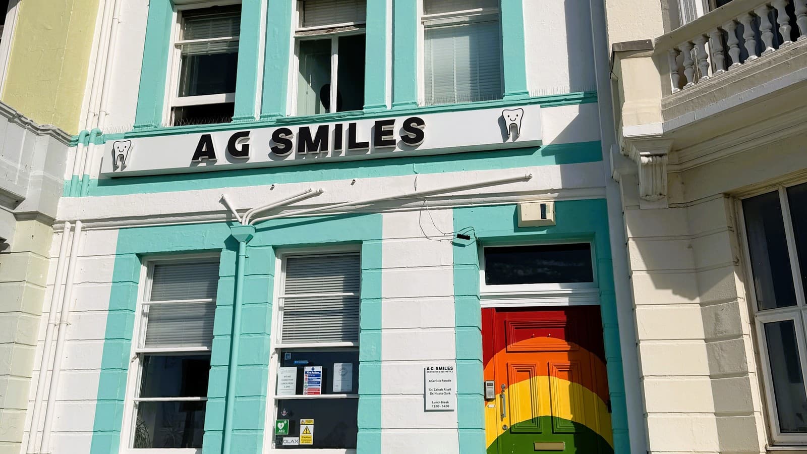 A.G. Smiles practice on Carlisle Parade in Hastings, with its rainbow front door